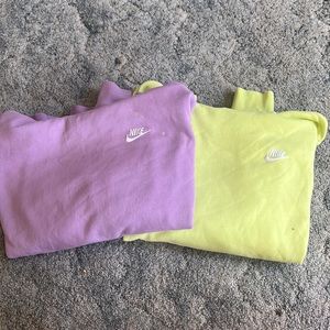 Two Nike hoodies